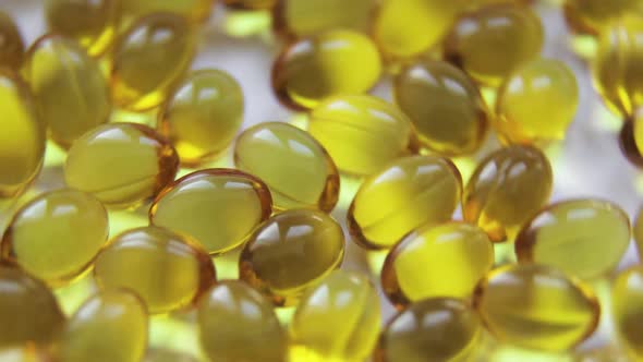 Organic Supplements Vitamins Yellow Capsules of Omega 3 or D 3 Pills alt