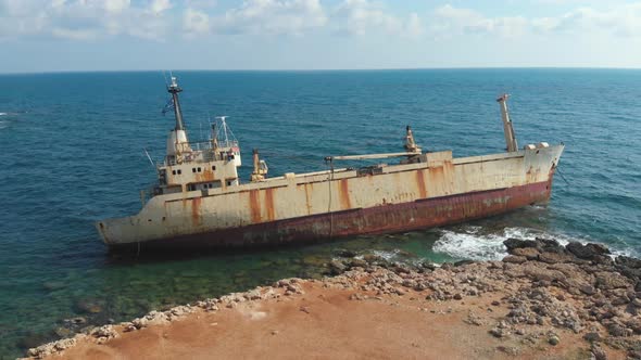 Abandoned Boat Strained on Beach alt