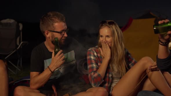 Bearded Caucasian Male in Glasses Sitting Near Blonde Beautiful Shy Female Kissing Her Check alt