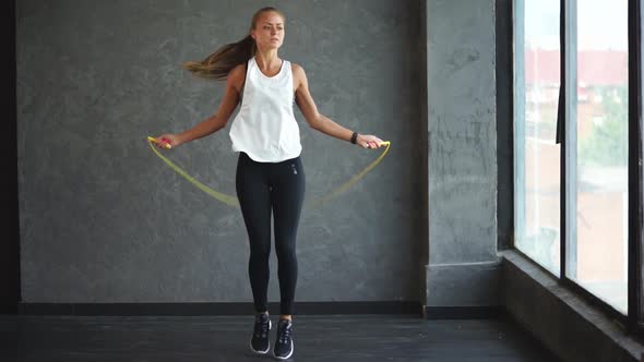 Beautiful Fitness Woman Doing Sport Exercises in the Gym alt