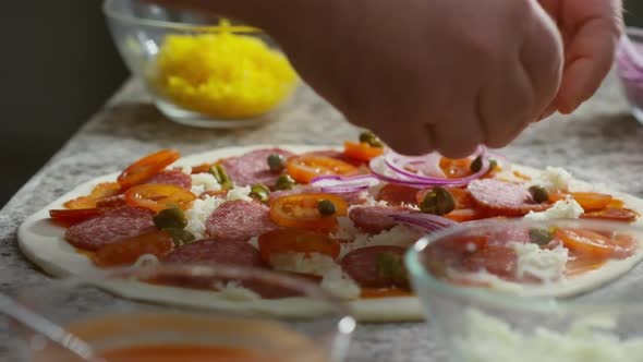 Adding Onion Circles to Pizza alt