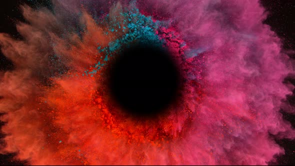 Super Slow Motion Shot of Color Powder Vortex Isolated on Black Background at 1000Fps alt