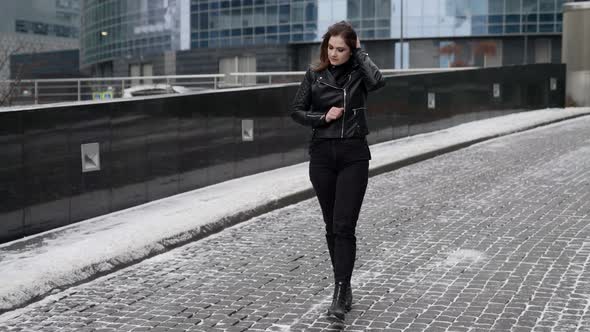 Winter Walk in City Lonely Young Woman in Black is Walking on Street Cold Weather alt