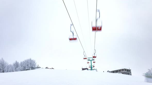 Ski Lift Skiers and Snowboarders Resort in Carpatian Mountains Time Lapse