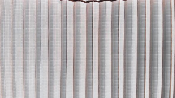 Big plantation with industrial commercial greenhouses. Massive greenhouse for growing vegetables alt