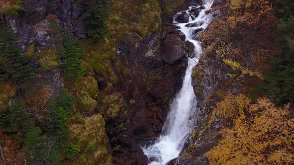 Beautiful Powerfull Waterfall in Green Forest Top View alt