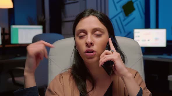 Exhausted Entrepreneur Discussing Management Graphs Gesturing During Negotiations alt