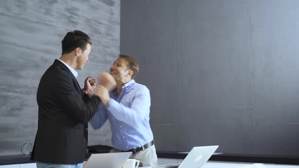 Successful business people rejoice. alt