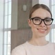 Pretty Girl Looking at Camera and Smiling. Beautiful Woman in Stylish Glasses - VideoHive Item for Sale