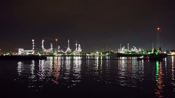 Petrochemical oil refinery and sea in industrial engineering in Bangna, Bangkok, Thailand. alt