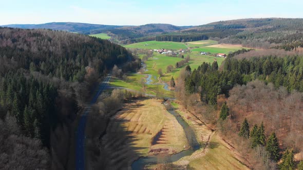 natural river flowing down the valley alt