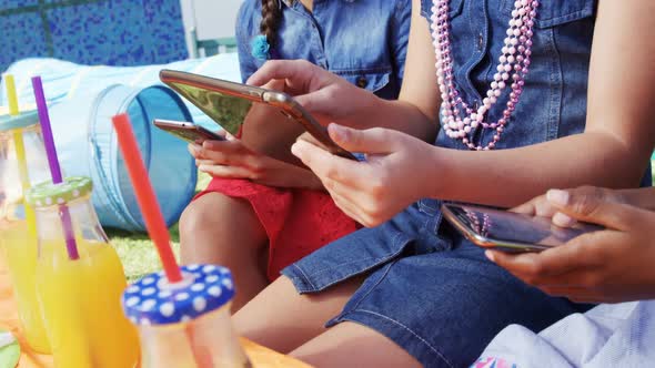 Kids using digital tablet and mobile phone 4k alt