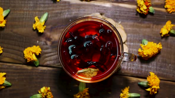 Antioxidant Natural Red Tea From Marigold Flowers Top View, Tea For Colds. Naturotherapy Medicinal