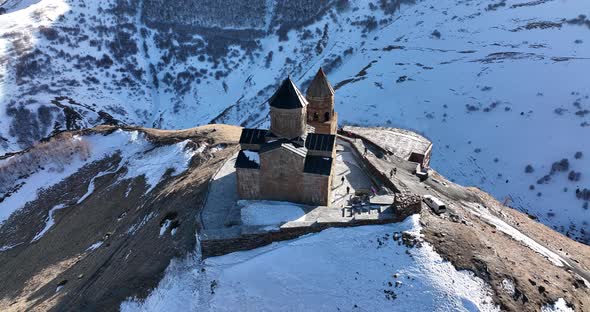 Aerial view of Gergeti Trinity Church, Tsminda Sameba in Kazbegi. Georgia 2022 alt