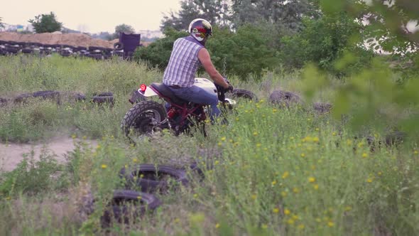 Professional Motorcyclist Drift and Turns on a Motorcycle on the Ground a Biker Does a Trick on a alt