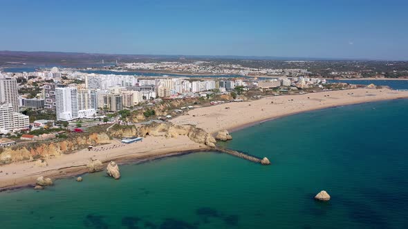 Beautiful Aerial Views of the Portuguese Southern City of Portimao Over the Stunning Beaches and alt