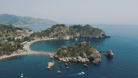 Panoramic view over of Isola Bella in Taormina in Island of Sicily Italy 4K