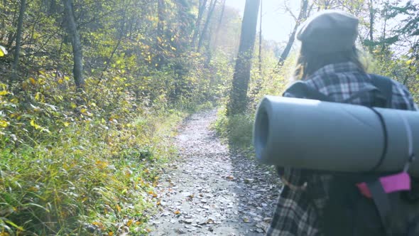 Girl on a Hike in the Mountains. Slow Motion Video alt