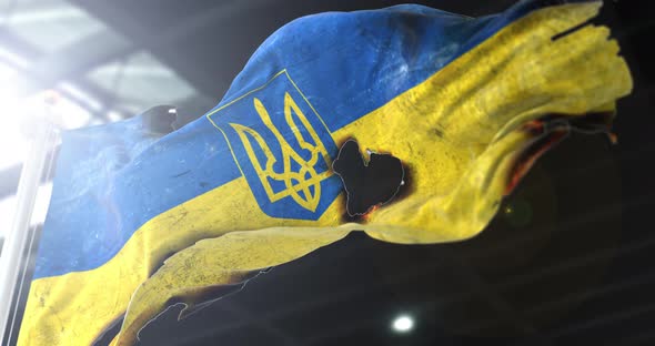 Ukrainian Damaged Flag Waving on the Wind
