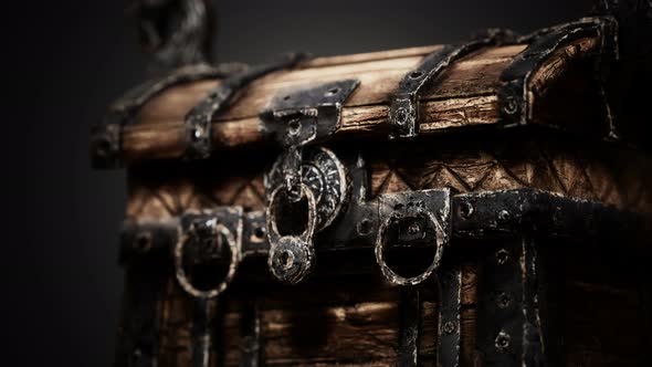 Closed Wooden Treasure Chest with Metal Clasp