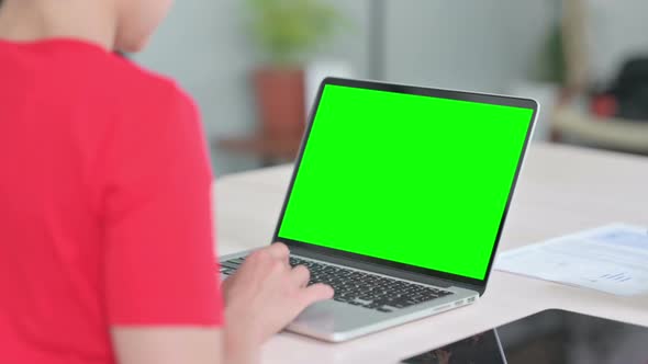 Indian Woman Using Laptop with Green Screen alt