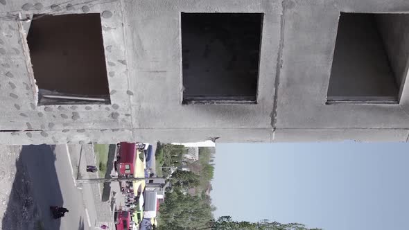 Vertical Video of a Multistorey Building Destroyed During the War in Ukraine alt