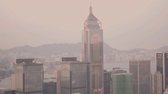 Central Plaza skyscraper in the Hong Kong city skyline. Aerial drone view alt