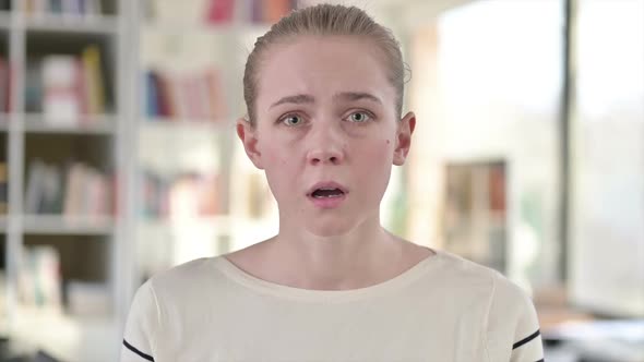 Portrait of Disappointed Young Woman Having Loss Failure alt