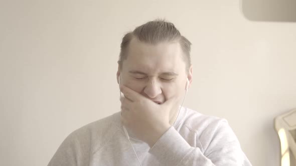 Brunette Caucasian Man Yawning As Listening To Colleagues in Online Video Chat. Portrait of Handsome alt