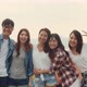 Group of Asia best friends teenagers take picture with automatic camera enjoy happy moments. - VideoHive Item for Sale