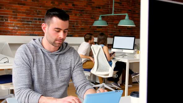 Executive using digital tablet 4k alt