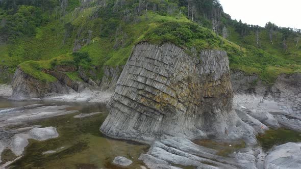 Aerial View Around Cape Stolbchaty, Volcanic Rock Formation on Kunashir island, Russia.