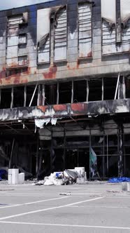 Vertical Video of a Bombed Shopping Center During the War in Bucha Ukraine alt
