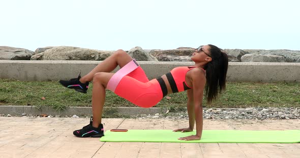 Fitness training outdoors. Attractive fit black woman. Workout outdoors. Healthy lifestyle.