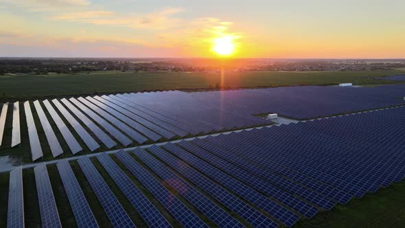 Aerial View of Large Solar Panels at a Solar Farm at Bright Summer Sunset, Solar Cell Power Plants alt