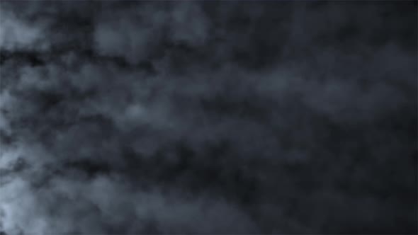 Fast Moving Puffs of Smoke on an Isolated Black Background alt