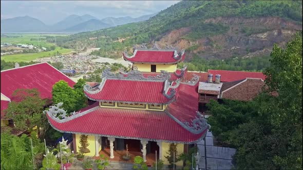 Flycam Moves To Ancient Buddhist Temple Building Yard alt