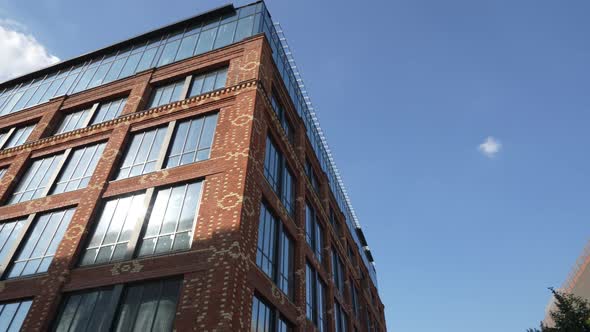 Unusual Brick Building with Panoramic Large Windows