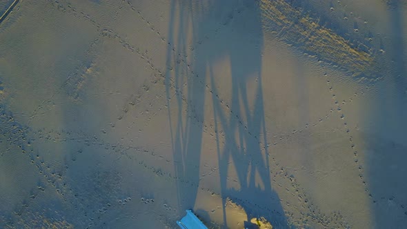 Aerial drone uav view of a lifeguard tower and the beach. alt