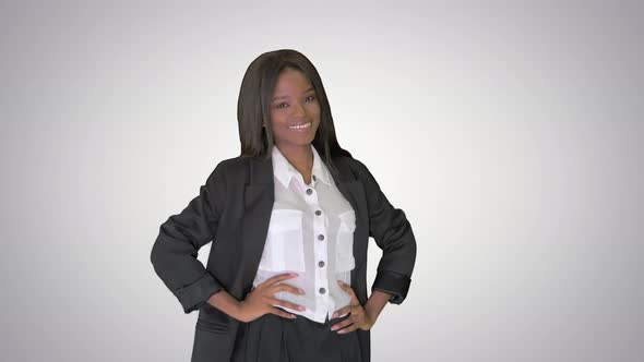Pretty African American Business Woman Smiling on Gradient Background. alt