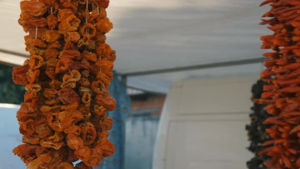 Bundle of Red Peppers Dry in the Sun