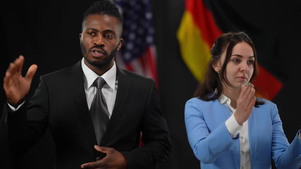 African American and Caucasian Politicians Thanking Audience for Attention at Press Conference alt