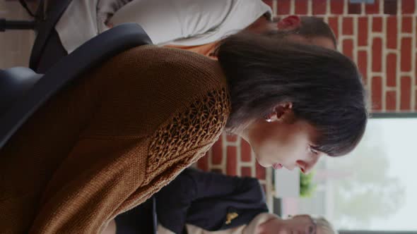 Vertical Video Woman Sharing Sad Story with People and Psychologist at Aa Group Therapy Session alt