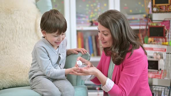 Mother Teaching son Sanitary Prevention Measures  alt
