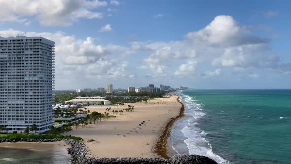 Fort Lauderdale, Florida beach and hotels on sunny day, leaving port alt