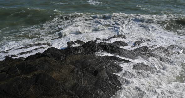 Waves splashing on rocks. Le Pouldu, Finistere department, Brittany, France alt
