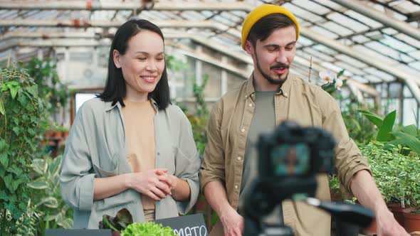 Young Woman and Man Filming Show about Harvest alt