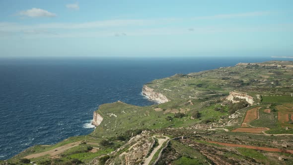 AERIAL: Dingli Cliffs with Greeny Nature and Blue Mediterranean Sea During Winter