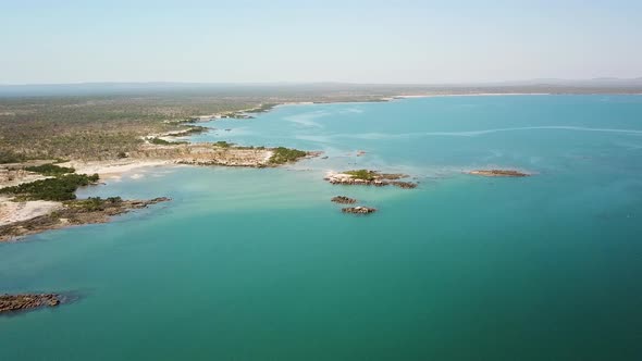 Isolated tropical Northern Australia coast in Kimberley region, Aerial tracking forward alt