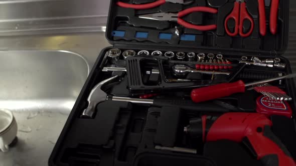 Manipulating plumbing tools alt